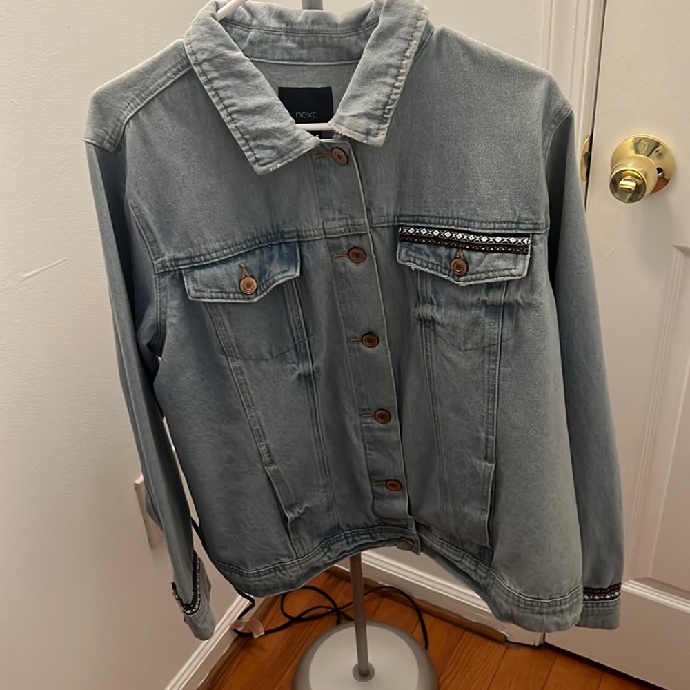 Denim jacket with a beautiful back decoration